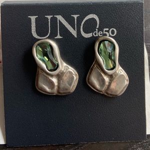 Uno de 50 croc tear post earrings.